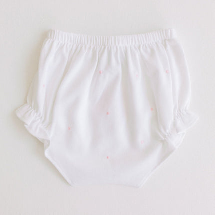 White diaper cover with a subtle pattern on a light gray background